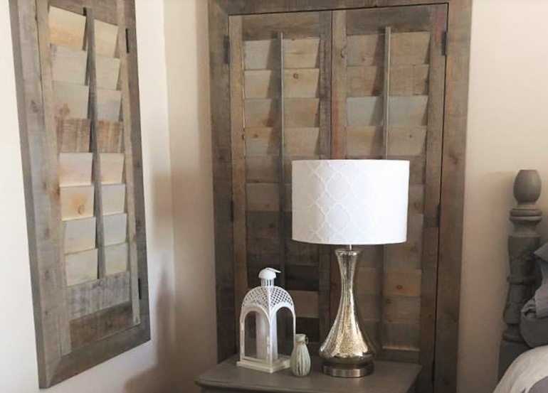 Minneapolis bedroom with repurposed wood shutters.